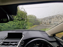 Cracked rainy car windscreen before FixGlass replacement