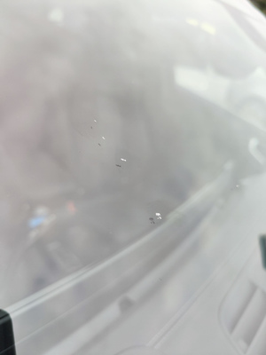 Example of surface-level marks on a windscreen