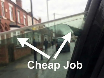 Poor quality window tint showing gap and peeling film