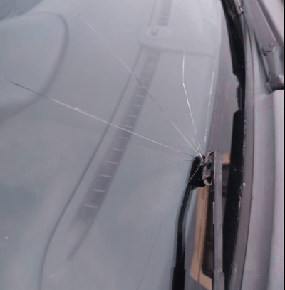 Close-up of a front windscreen crack on a Porsche Boxster before FixGlass replacement